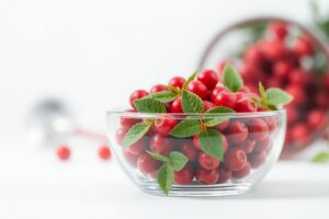 🌿 Hawthorn and Blood Pressure: The Ancient Herb Backed by Science Fresh hawthorn berries and leaves arranged beside a stethoscope, symbolizing the connection between hawthorn and healthy blood pressure.